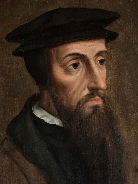 Retrato pintado de João Calvino com barrete preto e longa barba.